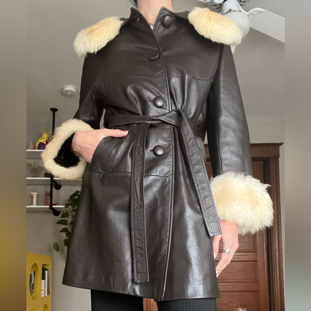 Brown leather jacket with fur trim